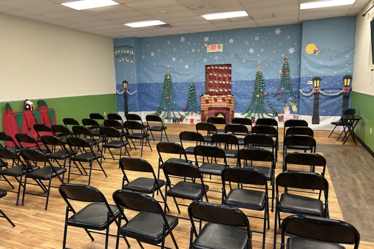 Chairs set up for an event in the school hall